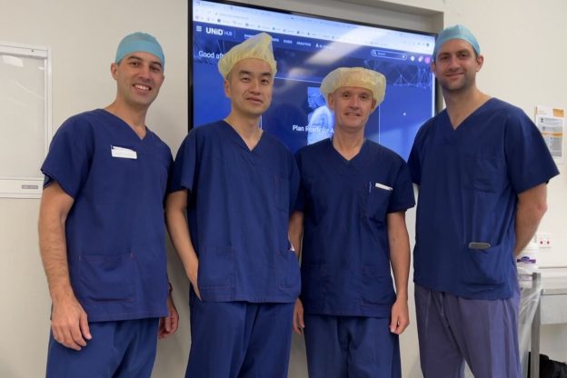 Keat Ooi and the team trained in new spine surgery technology